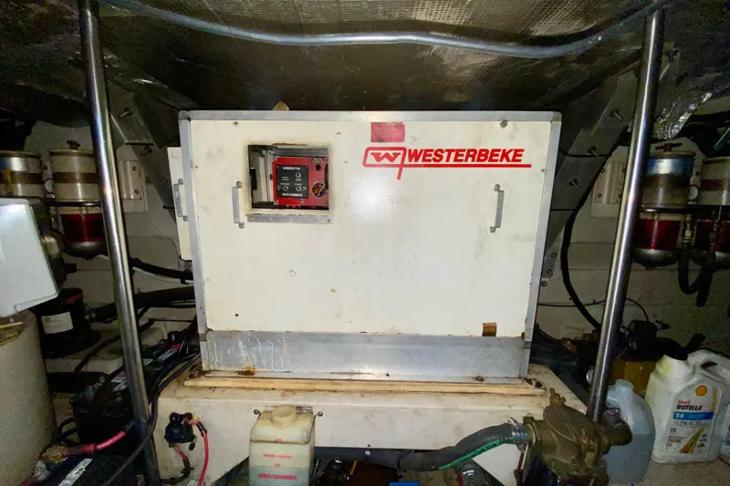  Yacht Photos Pics Engine room of 1999 Sea Ray 460 Sundancer with Westerbeke generator.