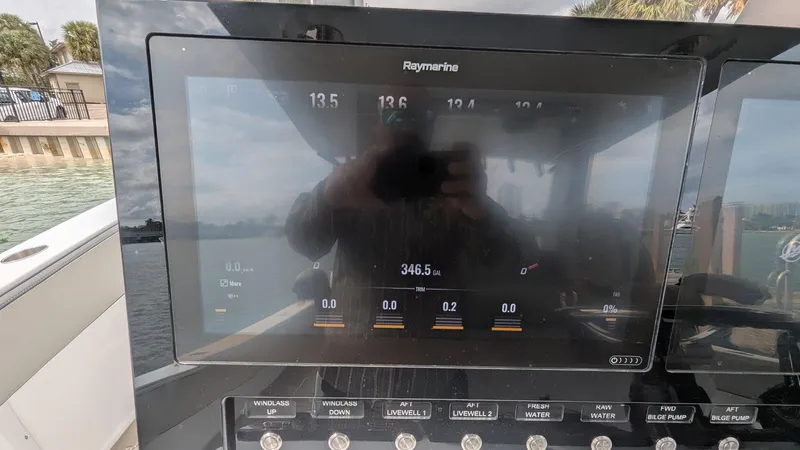  Yacht Photos Pics Raymarine display on 2021 Vela 368 Center Console boat, showing navigation data.