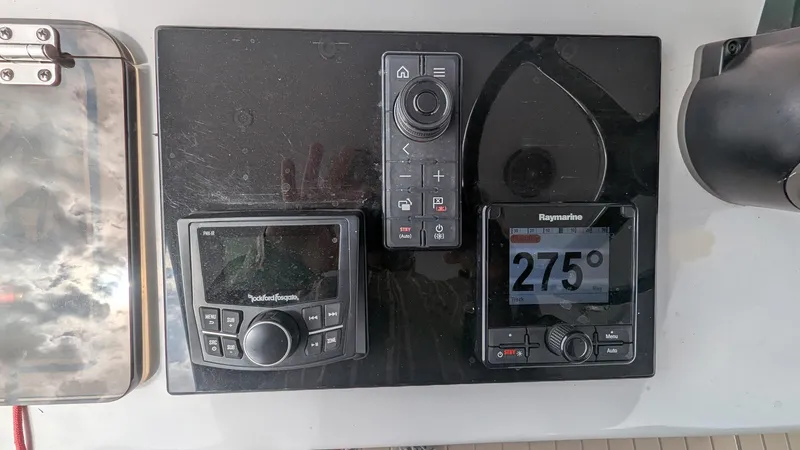  Yacht Photos Pics Control panel of a 2021 Vela 368 Center Console boat with navigation instruments.