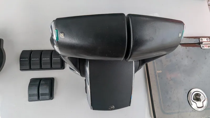  Yacht Photos Pics Throttle controls and switches on a 2021 Vela 368 Center Console boat.