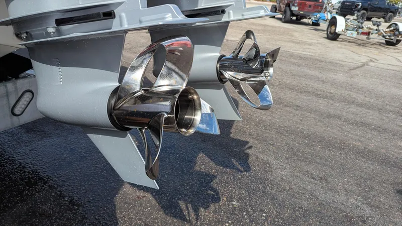  Yacht Photos Pics Twin stainless steel propellers on a 2021 Vela 368 Center Console boat.