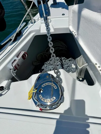 Fasttack Yacht Photos Pics Anchor chain and windlass on 2024 Beneteau Oceanis 30.1 sailboat deck.