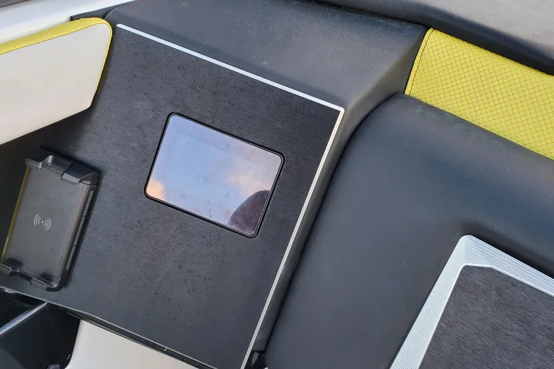  Yacht Photos Pics 2024 Scarab 285 Wake ID dashboard with touchscreen and wireless charging pad.