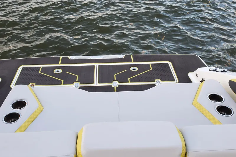  Yacht Photos Pics 2024 Scarab 285 Wake ID boat deck with stylish seating and cup holders.