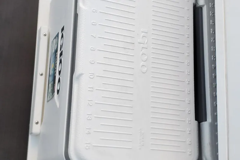  Yacht Photos Pics White Igloo cooler with measurement markings, featured on a 2024 Scarab 285 Wake ID boat.