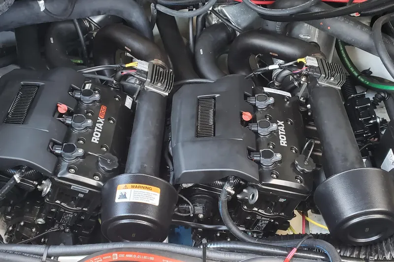  Yacht Photos Pics Twin Rotax engines in 2024 Scarab 285 Wake ID boat engine compartment.