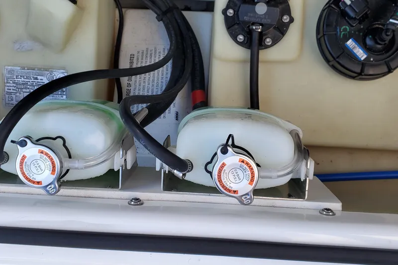  Yacht Photos Pics 2024 Scarab 285 Wake ID engine compartment with coolant reservoirs and wiring.