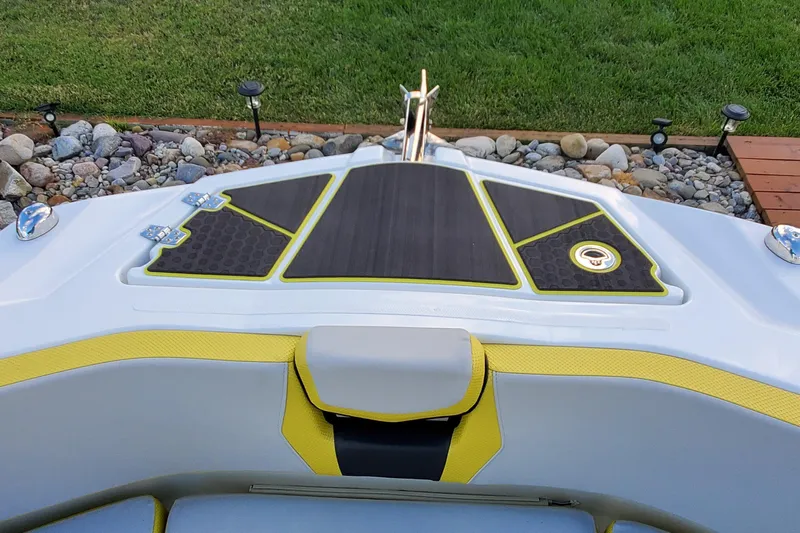  Yacht Photos Pics 2024 Scarab 285 Wake ID boat deck with yellow accents and sleek design.