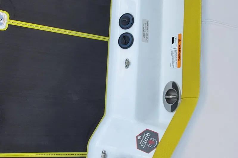  Yacht Photos Pics 2024 Scarab 285 Wake ID boat deck with yellow trim and safety warnings.