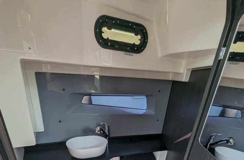  Yacht Photos Pics 2025 Navan S30 interior with modern sink and window design.