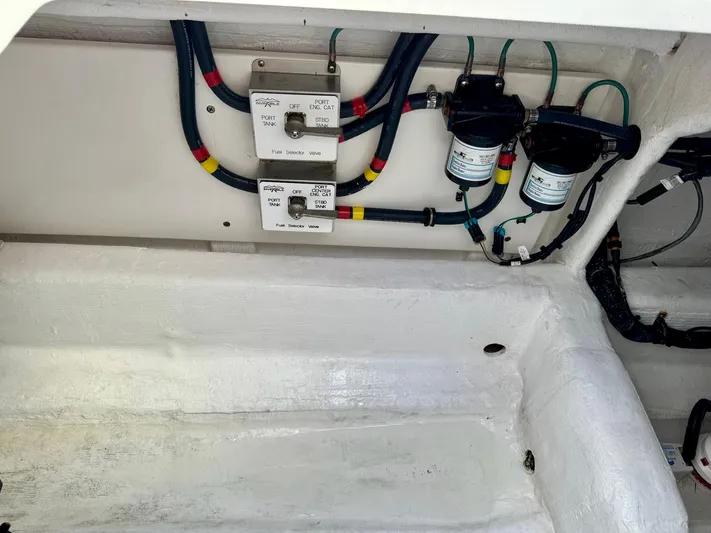 Lulu Yacht Photos Pics 2020 Invincible 35 Catamaran electrical wiring and components in the engine compartment.