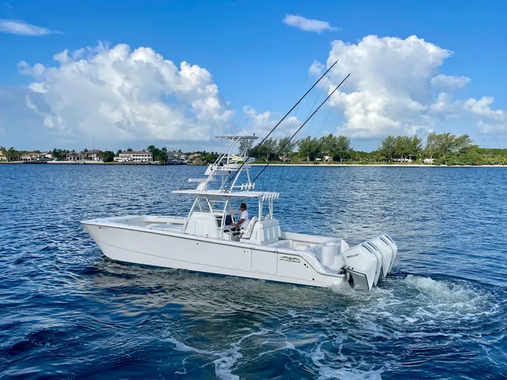 Lulu Yacht Photos Pics Invincible 35 Catamaran 2020 cruising on a sunny day with clear skies.