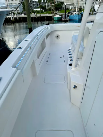 Lulu Yacht Photos Pics 2020 Invincible 35 Catamaran deck, spacious and sleek design, docked at marina.