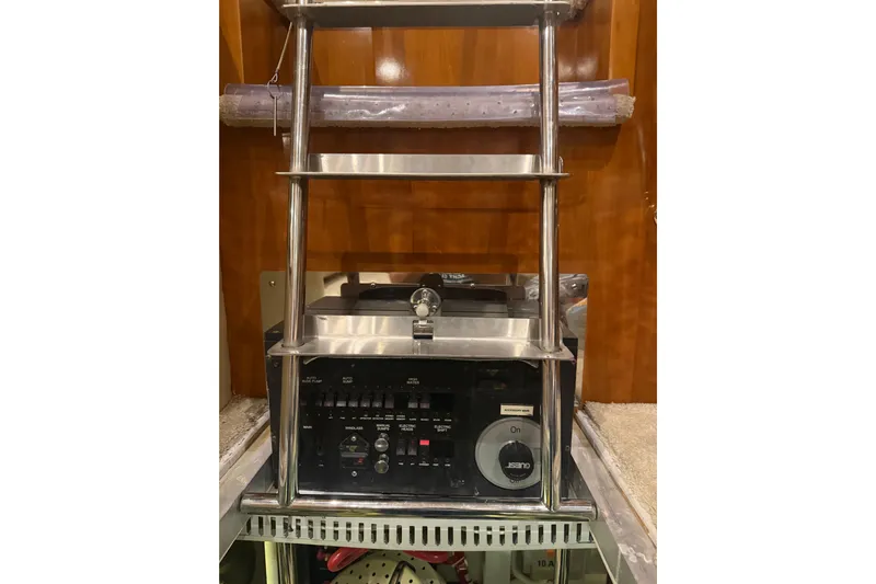 Tom’s Cruise Yacht Photos Pics Control panel and ladder inside 2005 Carver 466 Motor Yacht.