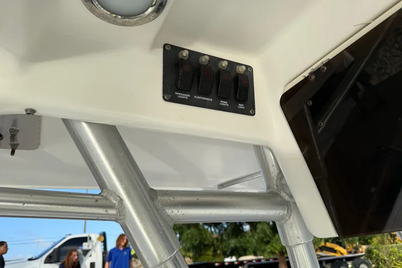 Overdraft Yacht Photos Pics 2005 Boston Whaler 320 Outrage control panel with switches and sturdy metal framework.