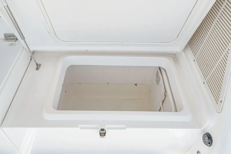 Reel Rodeo Yacht Photos Pics Open storage compartment on 2014 Maritimo 470 Offshore Convertible boat.