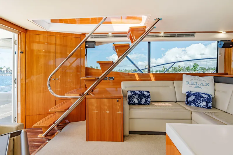 Reel Rodeo Yacht Photos Pics Luxurious interior of 2014 Maritimo 470 Offshore Convertible yacht with elegant wood finishes.