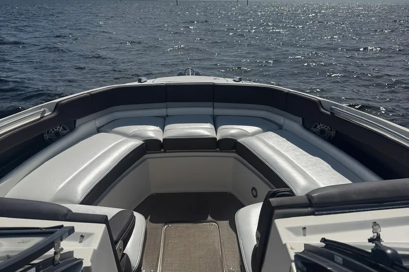  Yacht Photos Pics 2017 Sea Ray SLX 310 Outboard boat interior with luxurious seating on open water.