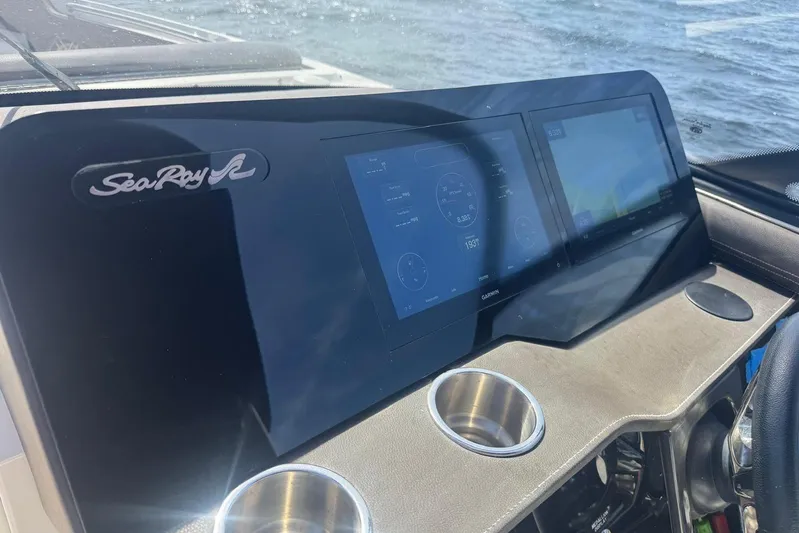 Yacht Photos Pics Dashboard of 2017 Sea Ray SLX 310 Outboard with digital displays and cup holders.