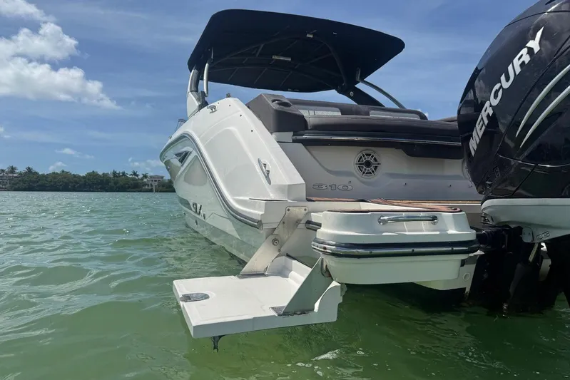  Yacht Photos Pics 2017 Sea Ray SLX 310 Outboard boat on water, featuring Mercury engines.