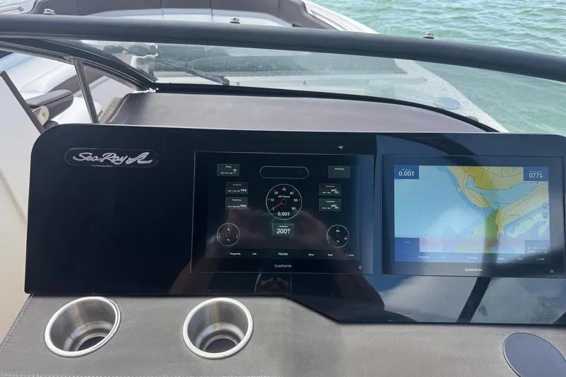  Yacht Photos Pics Dashboard of 2017 Sea Ray SLX 310 Outboard with Garmin navigation displays.