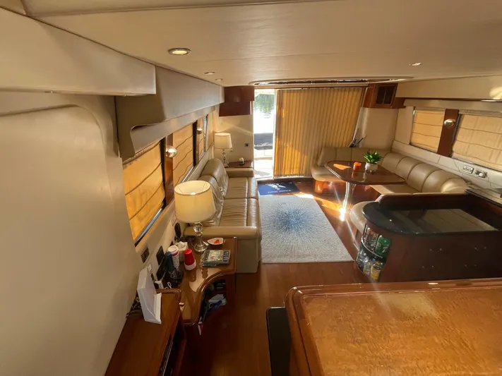 Seas The Day Yacht Photos Pics Interior of 2006 Carver 56 Voyager yacht, featuring luxurious seating and elegant decor.