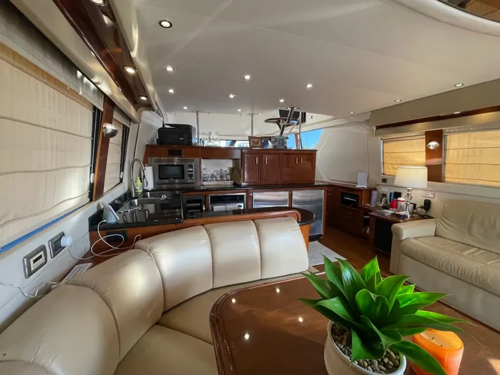 Seas The Day Yacht Photos Pics Luxurious interior of a 2006 Carver 56 Voyager yacht with modern amenities.