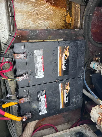 " A La Mer " Yacht Photos Pics Battery compartment of a 1988 Bertram 43 Convertible boat.