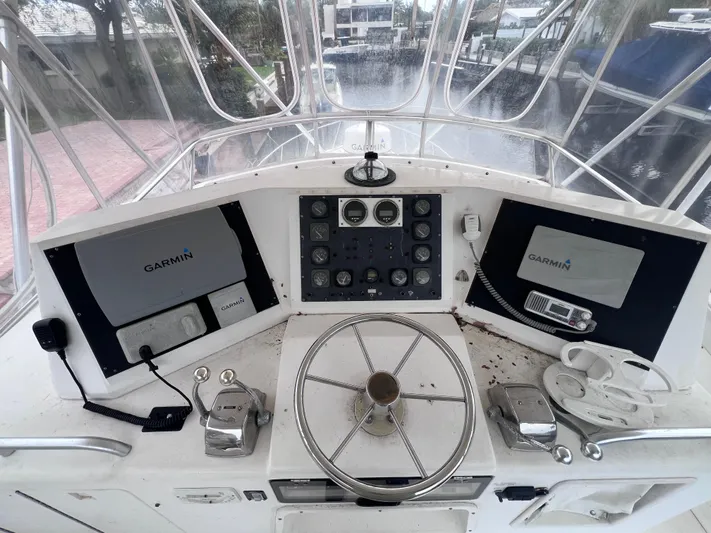" A La Mer " Yacht Photos Pics 1988 Bertram 43 Convertible boat helm with Garmin navigation systems.