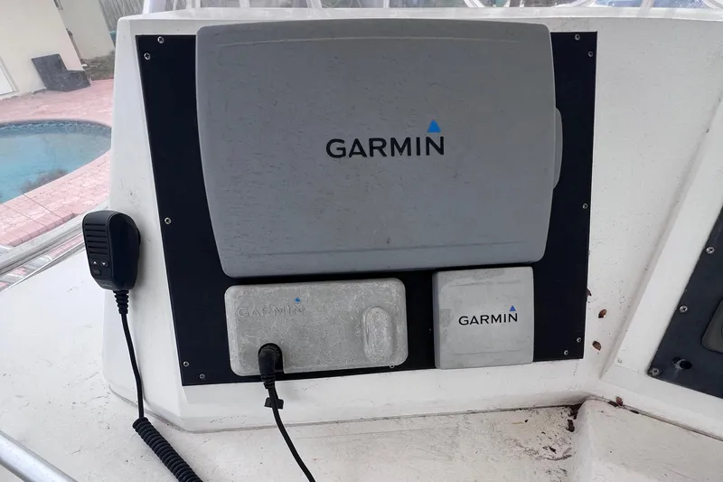 " A La Mer " Yacht Photos Pics Garmin navigation equipment on a 1988 Bertram 43 Convertible boat.