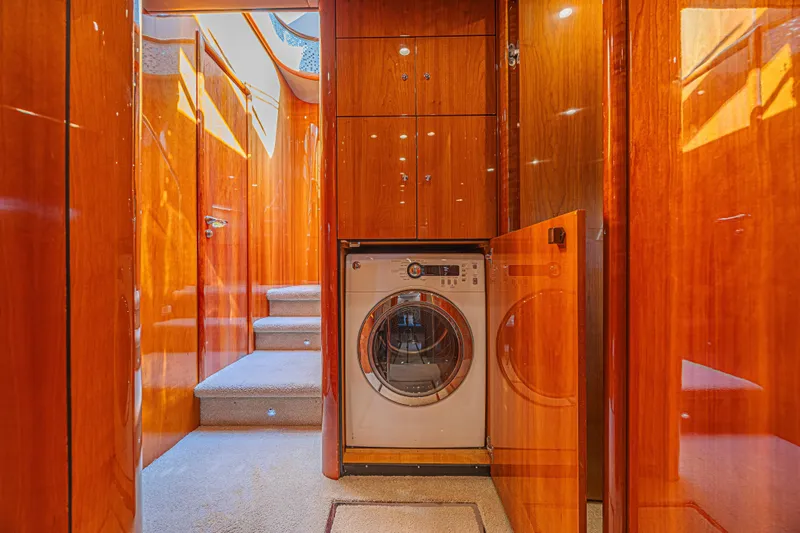 Big Chubby Xl Yacht Photos Pics Luxurious 2006 Sunseeker 75 Yacht interior with wood paneling and built-in washer.