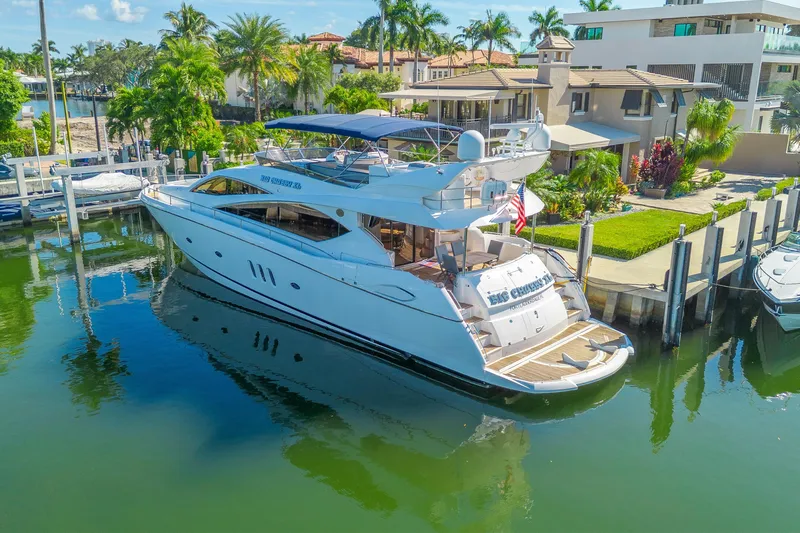 Big Chubby Xl Yacht Photos Pics 2006 Sunseeker 75 Yacht docked in a scenic waterfront setting.