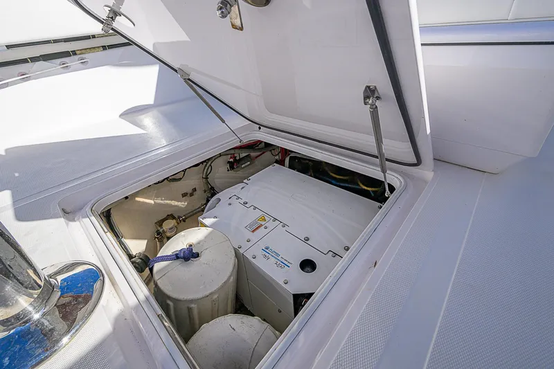 Mare Yacht Photos Pics Open hatch of 2019 Bahama 41 boat showing internal components and storage.