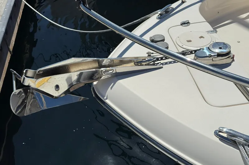  Yacht Photos Pics Anchor system on 2023 Grady-White Adventure 218 boat, docked in water.