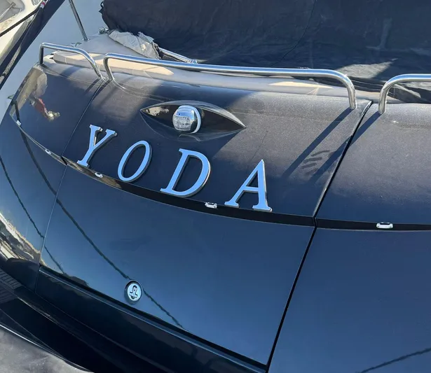 Yoda Yacht Photos Pics 2008 Sunseeker Predator 62 yacht with "YODA" nameplate on the stern.