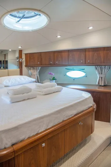 Yoda Yacht Photos Pics Luxurious cabin interior of 2008 Sunseeker Predator 62 yacht with elegant wood finishes.