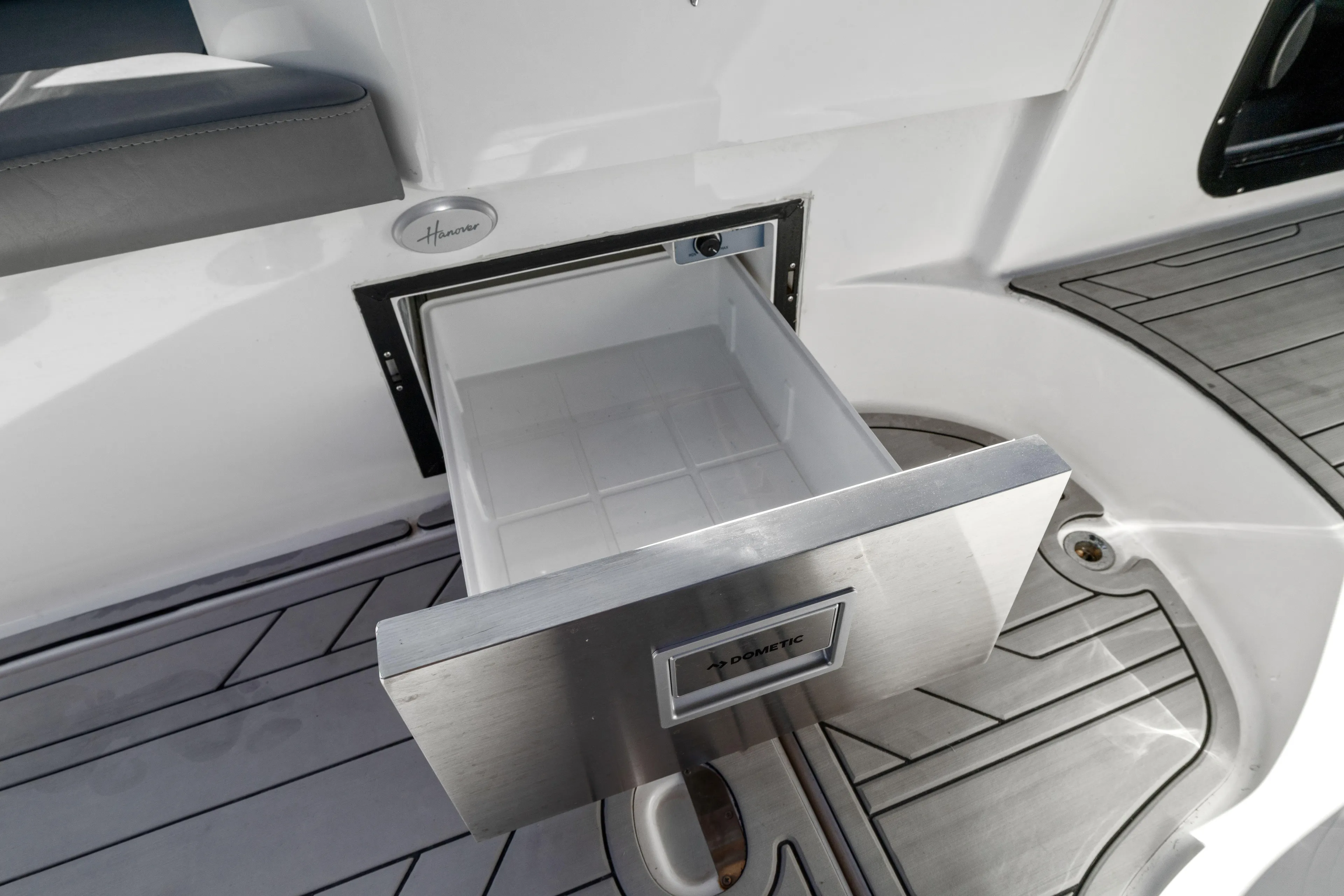 Yacht Photos Pics Open dometic cooler on Hanover 305 boat, showcasing sleek design and modern features, 2025 model.