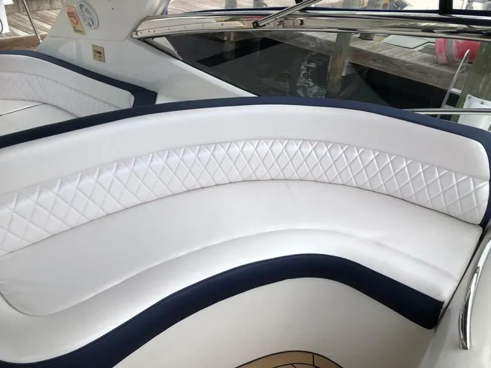  Yacht Photos Pics Luxurious white seating on 2003 Sunseeker Portofino 46 yacht with quilted design.