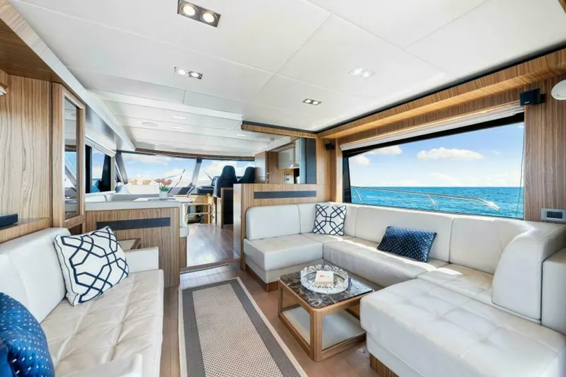 Mama's House Yacht Photos Pics Luxurious interior of 2018 Absolute 60 Flybridge yacht with ocean view.