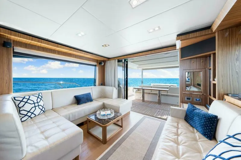 Mama's House Yacht Photos Pics Luxurious interior of 2018 Absolute 60 Flybridge yacht with ocean view.