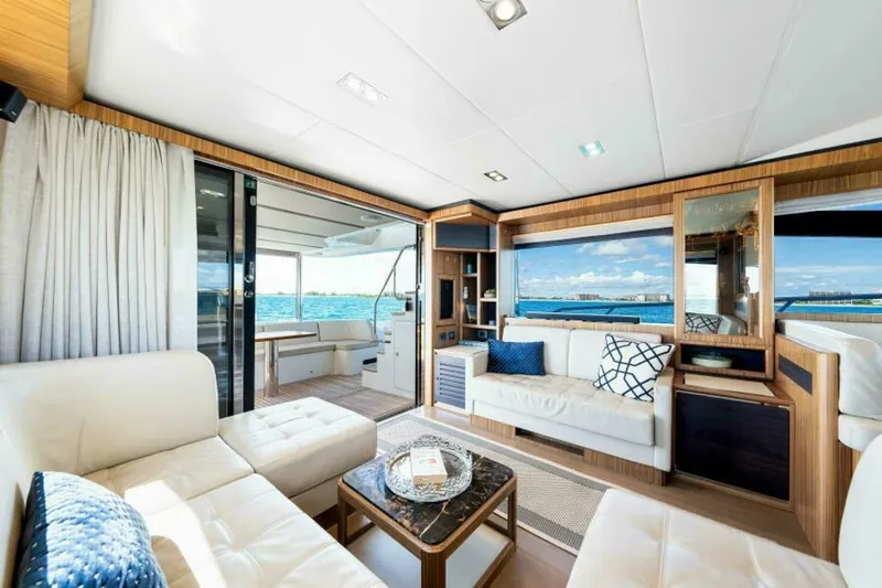 Mama's House Yacht Photos Pics Luxurious interior of 2018 Absolute 60 Flybridge yacht with ocean view.