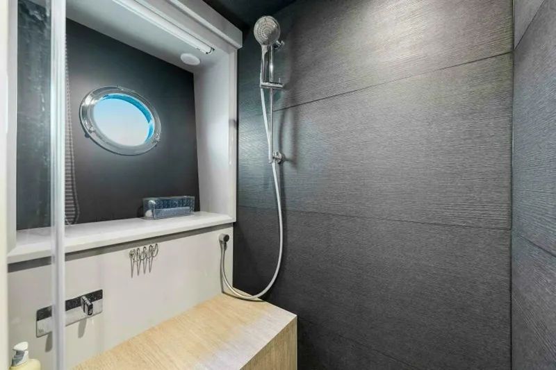 Mama's House Yacht Photos Pics Luxurious bathroom in 2018 Absolute 60 Flybridge yacht with modern shower design.