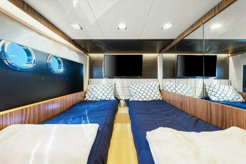 Mama's House Yacht Photos Pics Luxurious twin cabin interior of 2018 Absolute 60 Flybridge yacht with modern decor.