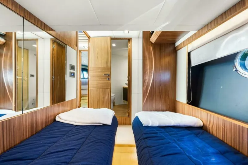 Mama's House Yacht Photos Pics Luxurious twin cabin interior of 2018 Absolute 60 Flybridge yacht.