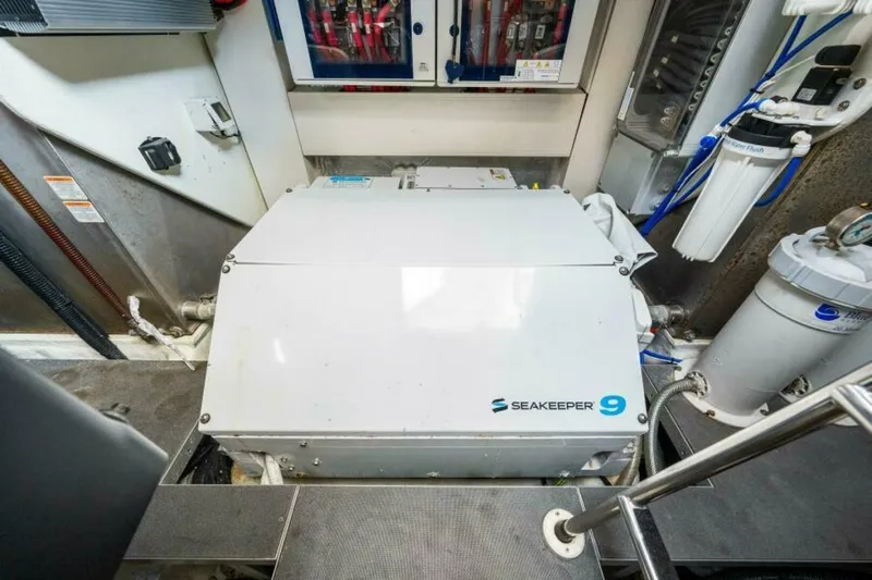 Mama's House Yacht Photos Pics Engine room of 2018 Absolute 60 Flybridge with Seakeeper 9 stabilizer system.