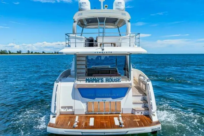 Mama's House Yacht Photos Pics Luxury 2018 Absolute 60 Flybridge yacht cruising on open water.