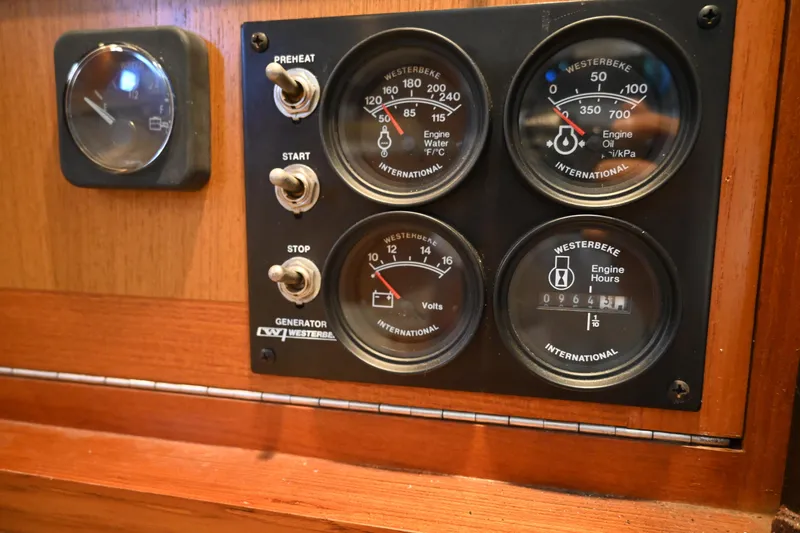 Done Deal Yacht Photos Pics Control panel of a 2001 Cabo 35 Express boat with Westerbeke gauges.