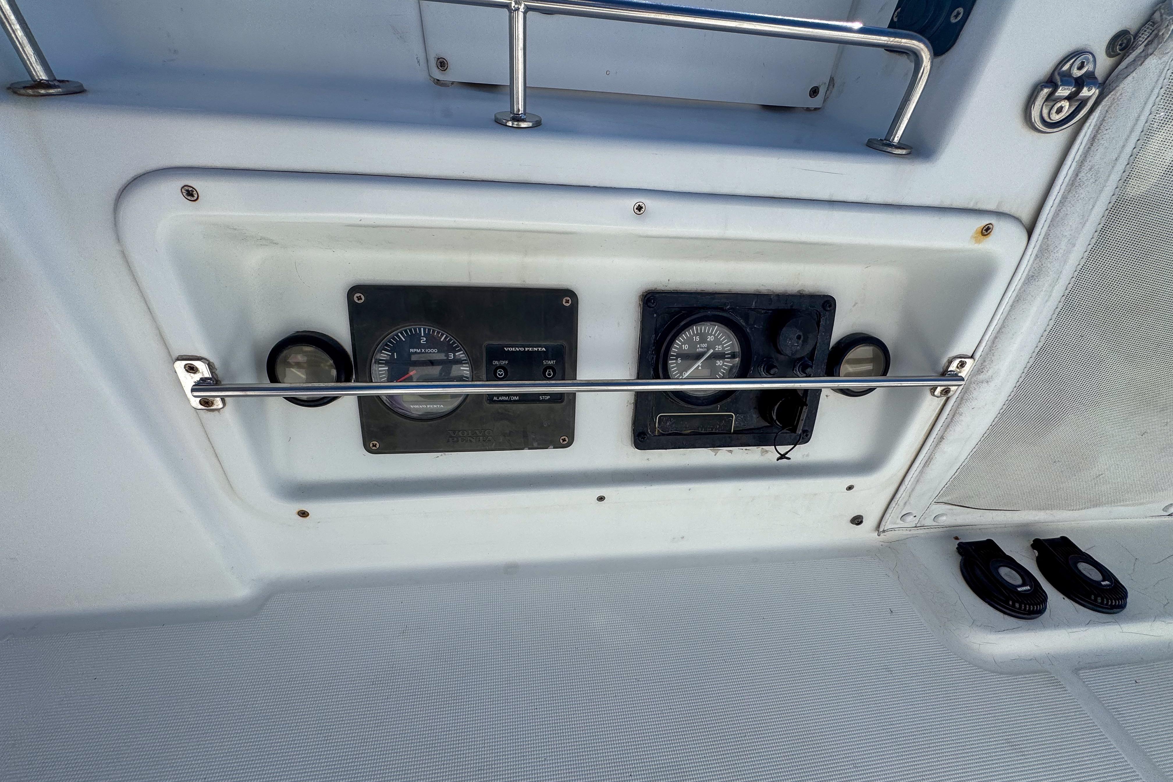Control panel of a 2005 Lagoon 440 catamaran with gauges and switches.