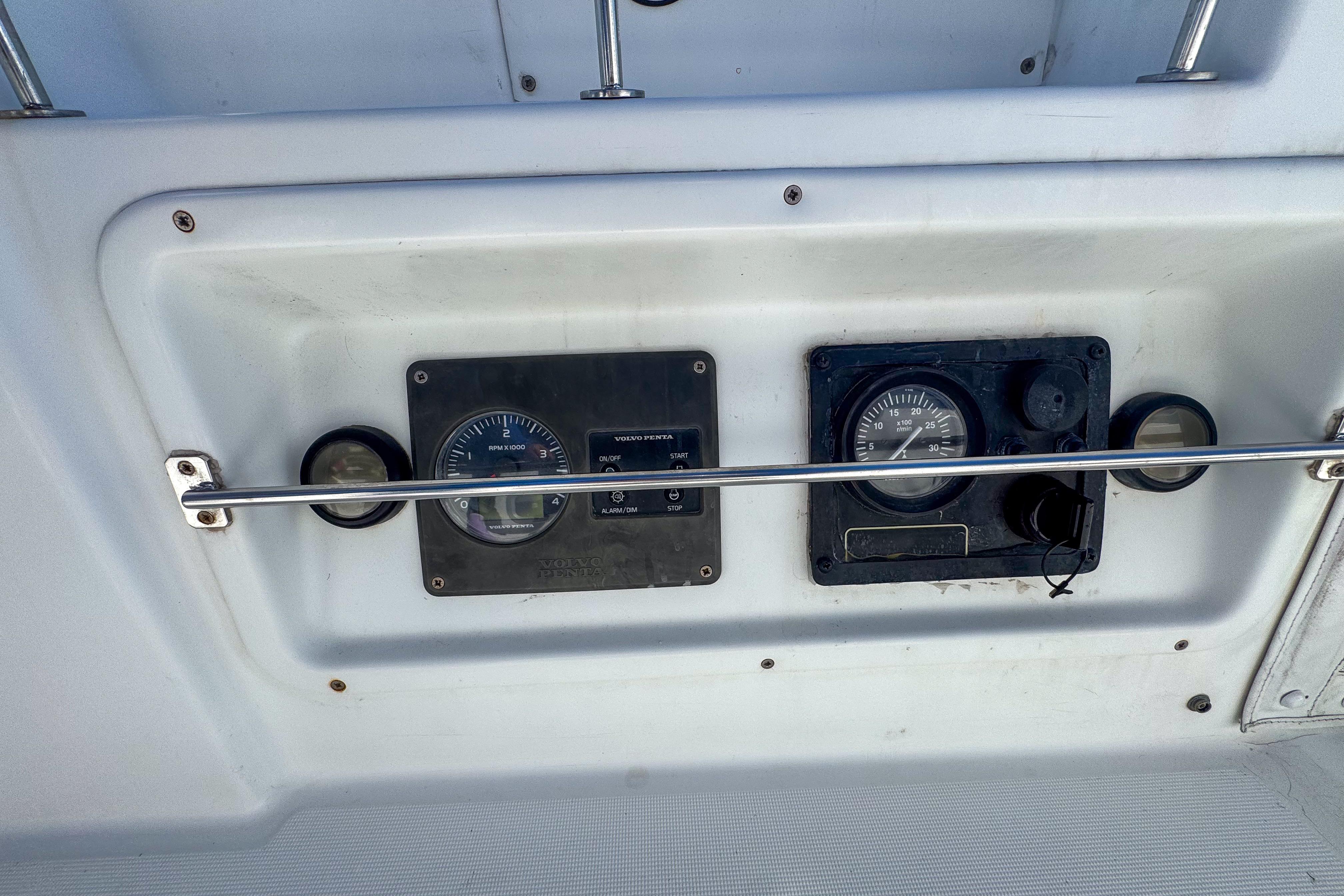 Control panel of a 2005 Lagoon 440 catamaran with gauges and switches.