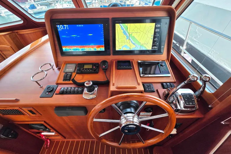  Yacht Photos Pics Helm of 2017 Sabre 42 Salon Express with navigation screens and controls.